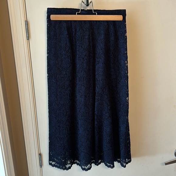 Uniqlo tea-length navy skirt, size S - Picture 1 of 5